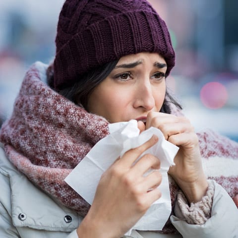 Photo of woman with winter allergies