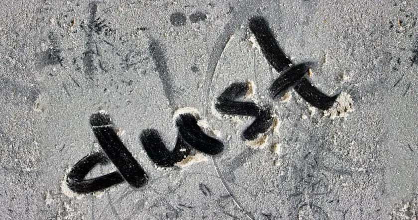 the word "dust" written into dust build up