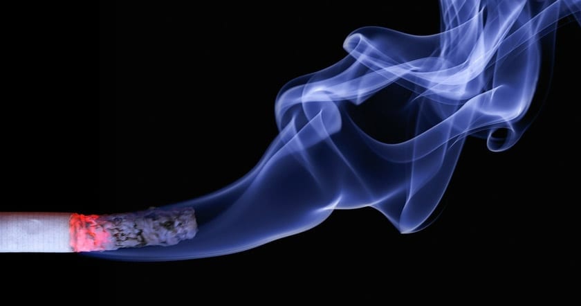 close up of cigarette burning and smoking
