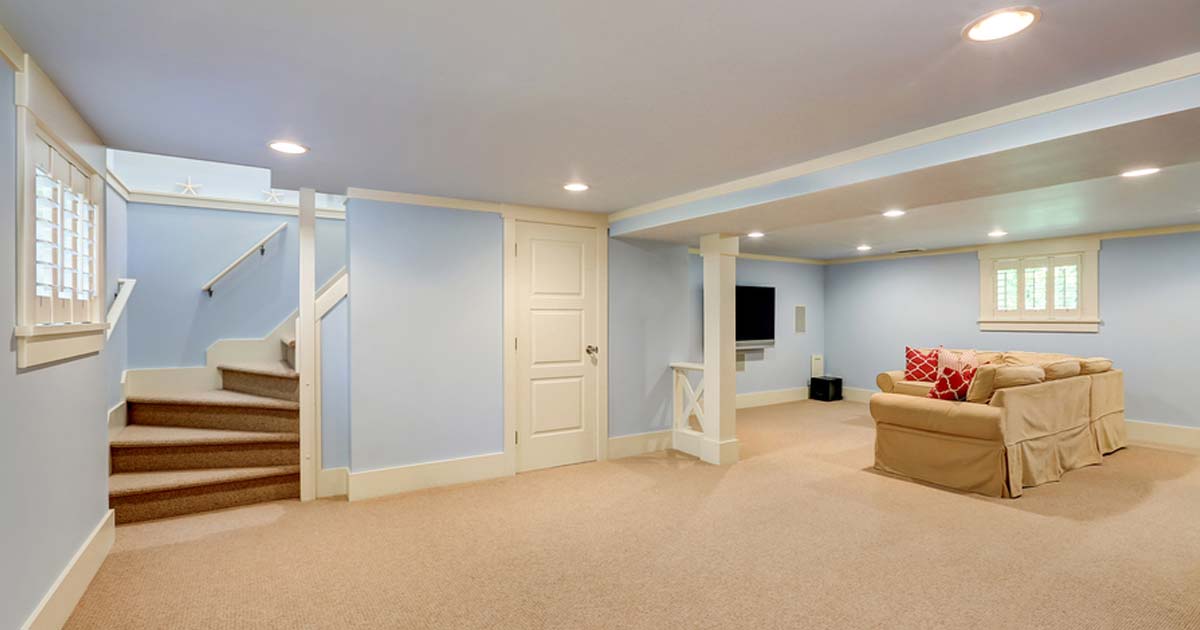 clean finished basement with media room seating