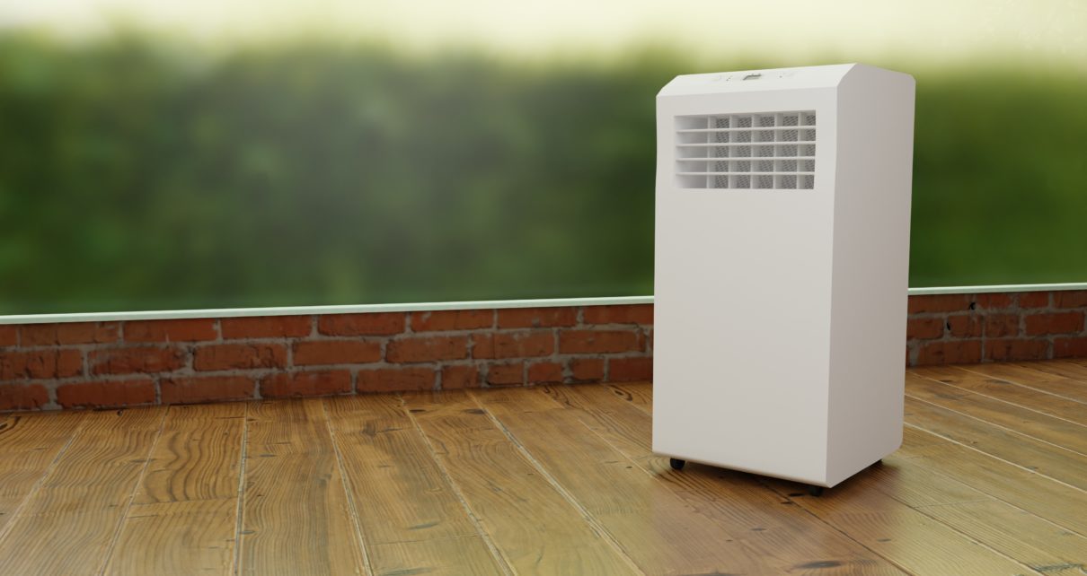 portable kenmore air conditioner on hardwood floor