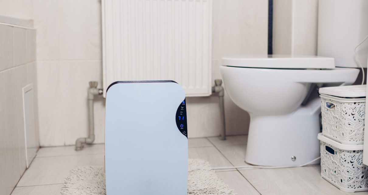 White Bathroom Air Purifier on Floor in Bathroom