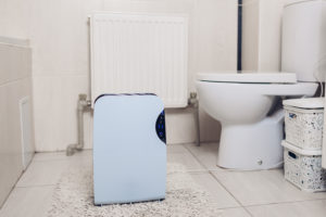 White Bathroom Air Purifier on Floor in Bathroom